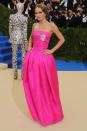 The stunner hit the red carpet in this hot pink custom Chanel strapless gown.