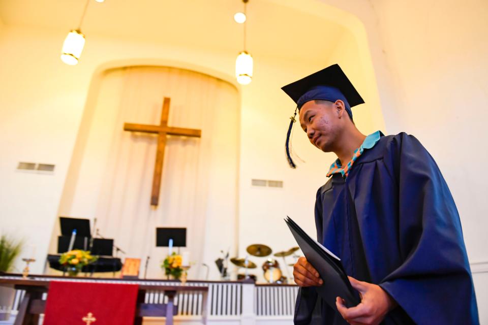 Zhan Cobb, 27, Soteria resident, graduates from the program on Sunday, June 11, 2023.