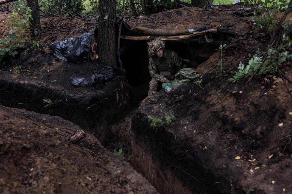 Ukrainian infantrymen in a trench on the front line contact line in Lugansk oblast, Ukraine, 29 July 2023.