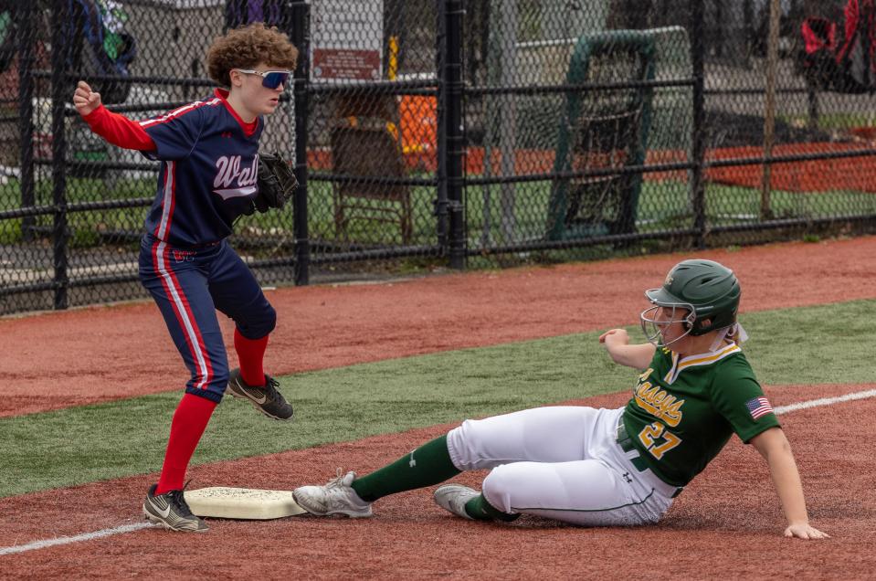 RBC Lily Hagan reaches third in first inning action. Red Bank Catholic Girls Softball defeats Wall 6-2 in home game on April 4, 2024