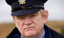 <p>Sergeant Gerry Boyle is an eccentric small-town cop with a confrontational and crass personality and a subversive sense of humour. <br><br><a rel="nofollow" href="http://au.movies.yahoo.com/movie/69126/the-guard/trailers/26259008/" data-ylk="slk:Watch 'The Guard' trailer;elm:context_link;itc:0;sec:content-canvas" class="link "> Watch 'The Guard' trailer</a></p>