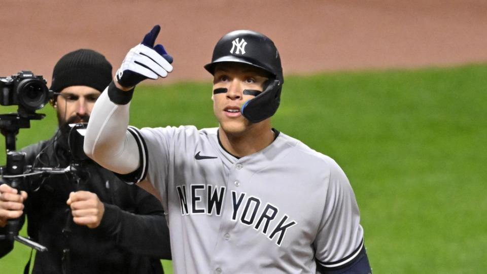 Oct 15, 2022;  Cleveland, Ohio, USA;  New York Yankees center fielder Aaron Judge (99) reacts after hitting a two run home run against the Cleveland Guardians in the third inning during game three of the NLDS for the 2022 MLB Playoffs at Progressive Field.  Mandatory Credit: David Richard-USA TODAY Sports