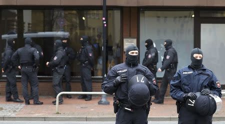 German special police forces outside a muslim prayer room in Hildesheim, Germany, March 14, 2017. REUTERS/Kai Pfaffenbach