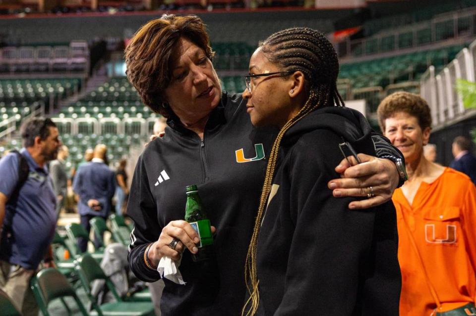 University of Miami Women’s Head Coach Katie Meier interacts with guard Jasmyne Roberts after she delivered her retirement speech during a press conference at Watsco Center in Coral Gables on Friday, March 22, 2024.