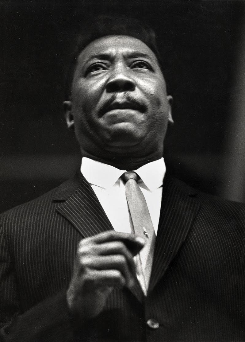 This handout photo provided by the National Portrait Gallery, taken in 1960, shows Muddy Waters, by Charles H. Stewart. Curators at the National Portrait Gallery want to know what it means to be cool. They have been studying the uniquely American concept of “cool” and how it became a global export, and the museum now is bringing together 100 photographs of people who helped create the idea of “cool” as a name for rebellion, self-expression, charisma, edge and mystery. It includes musicians, actors, singers, athletes, comedians, activists and writers as photographed by Richard Avedon, Annie Leibovitz and others. (AP Photo/Charles H. Stewart, National Portrait Gallery)