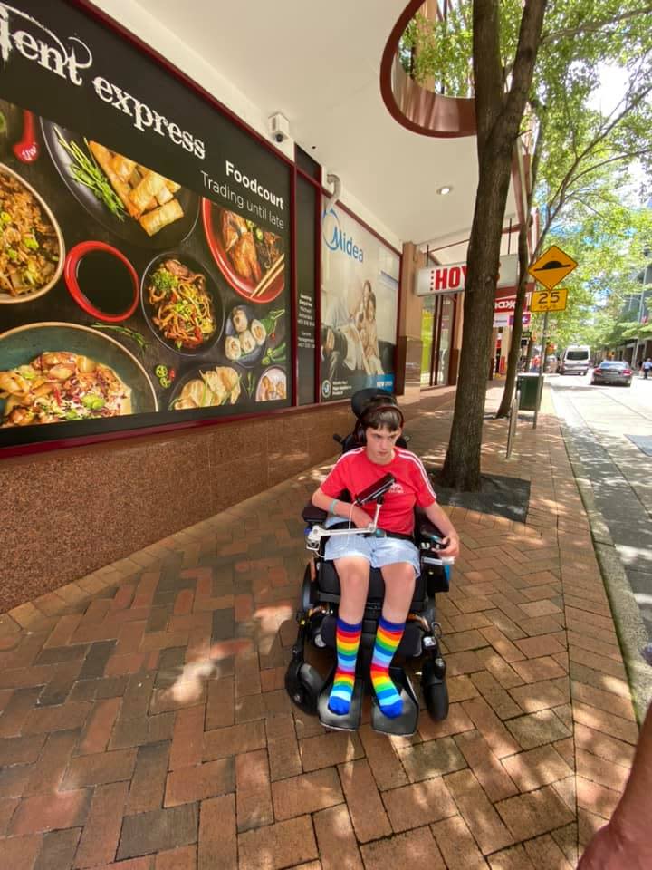 Pictured is Bodhi Fabig in his wheelchair. He had his wallet stolen by a couple, his mum says.