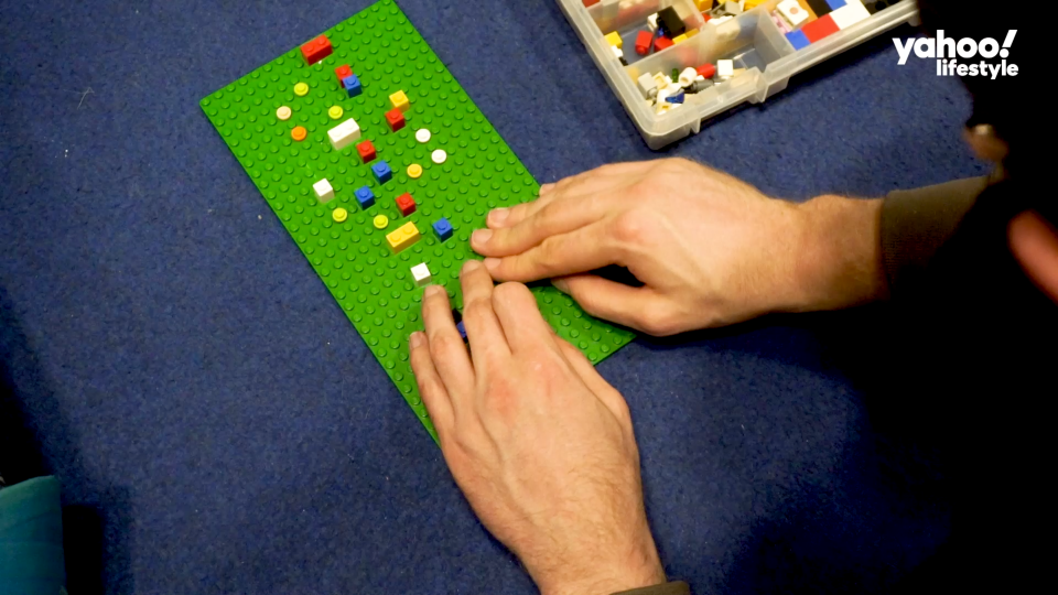 Shifrin prepares for his climb by using a LEGO representation of the route.