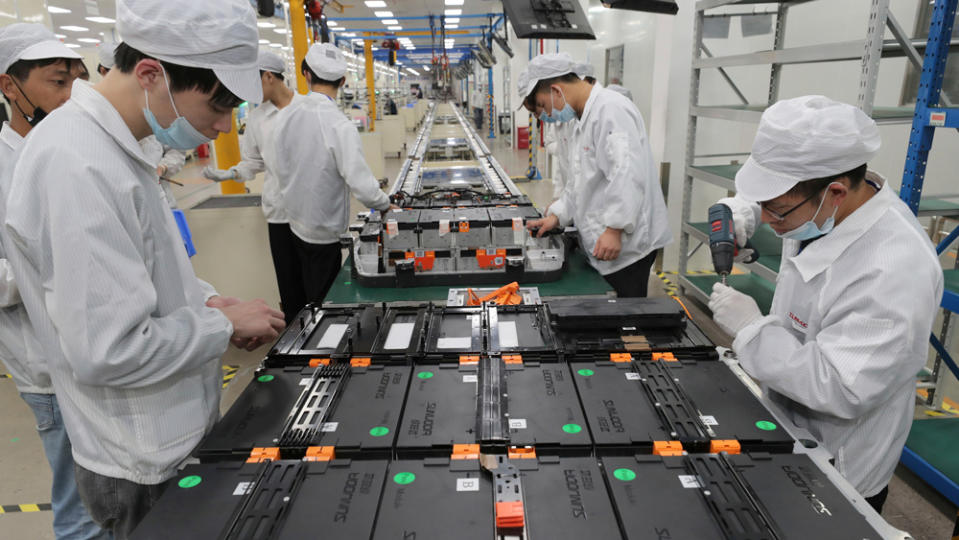 Assembling battery packs at a Sunwoda Electric Vehicle Battery factory in China - Credit: Photo by Xu Congun/FeatureChina/AP Images.