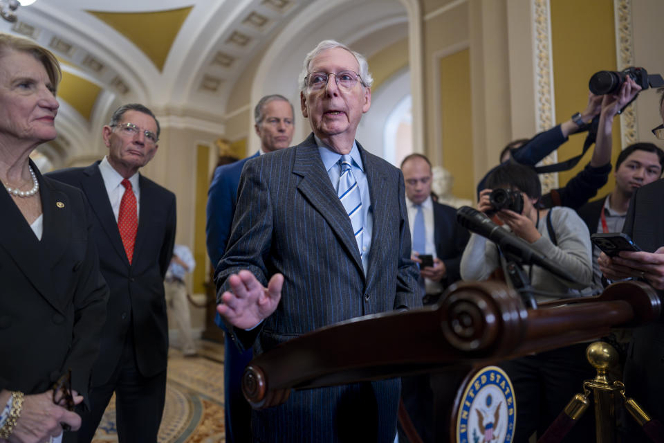 Senate Minority Leader Mitch McConnell, R-Ky., center, joined from left by Sen. Shelley Moore Capito, R-W.Va., Sen. John Barrasso, R-Wyo., and Whip John Thune, R-S.D., meets with reporters following a Republican strategy session, at the Capitol in Washington, Wednesday, March 20, 2024. (AP Photo/J. Scott Applewhite)