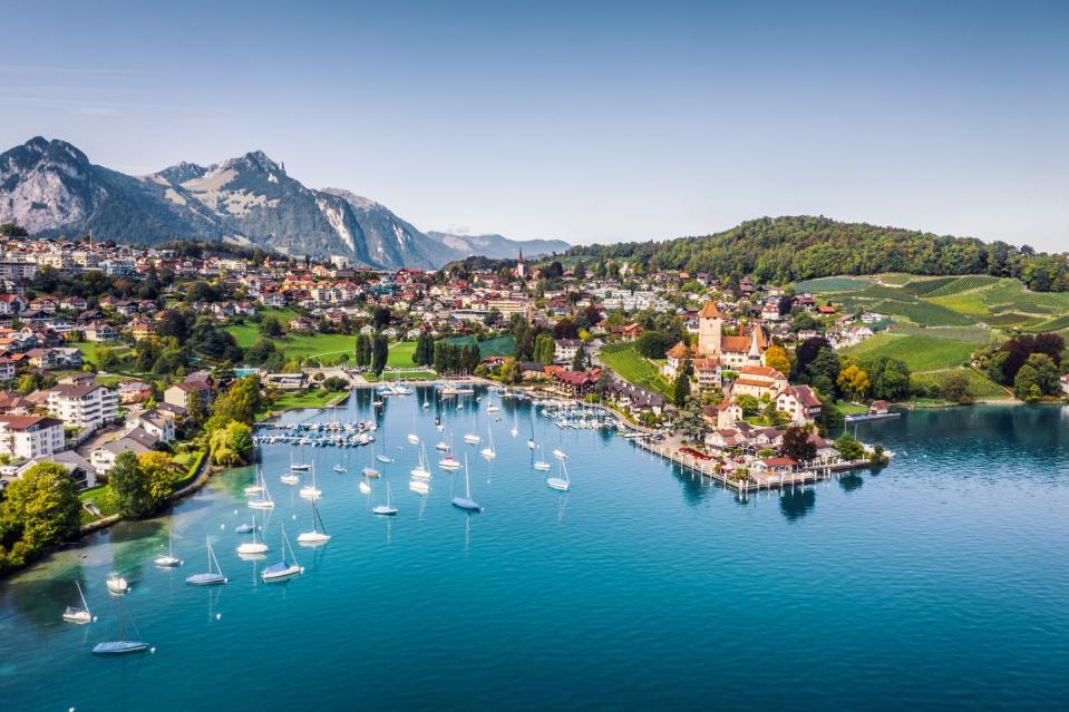 spiez castle by lake thun in canton of bern, switzerland