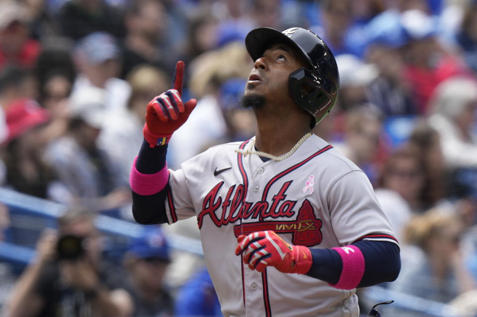 Atlanta Braves second baseman Ozzie Albies celebrates after his two-run home run against the Toronto Blue during third-inning baseball game action in Toronto, Ontario, Sunday, May 14, 2023. (Frank Gunn/The Canadian Press via AP)