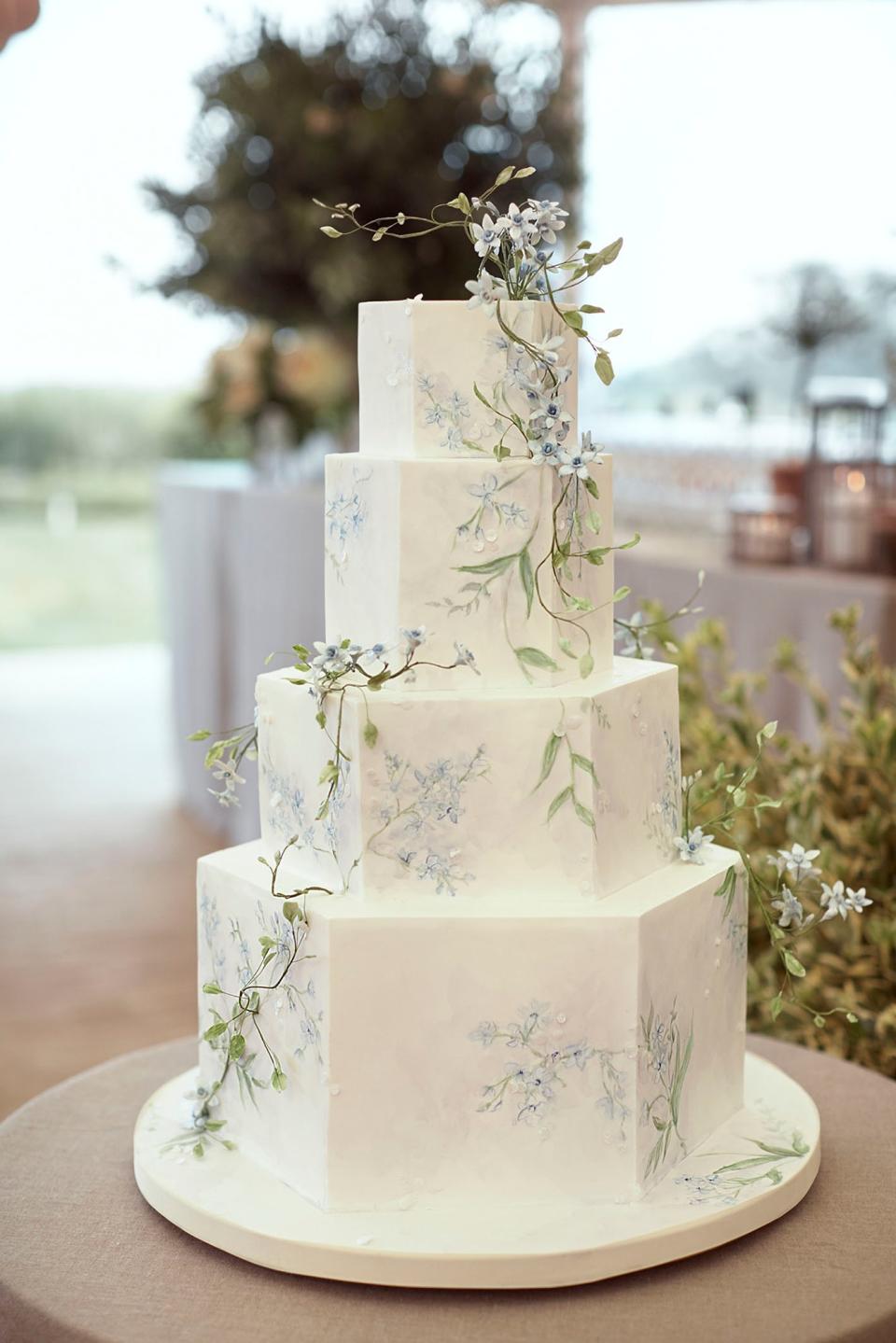 The iridescent cake was created by Madison Lee’s Cakes. It was carrot cake, the same flavor my parents had at their wedding.