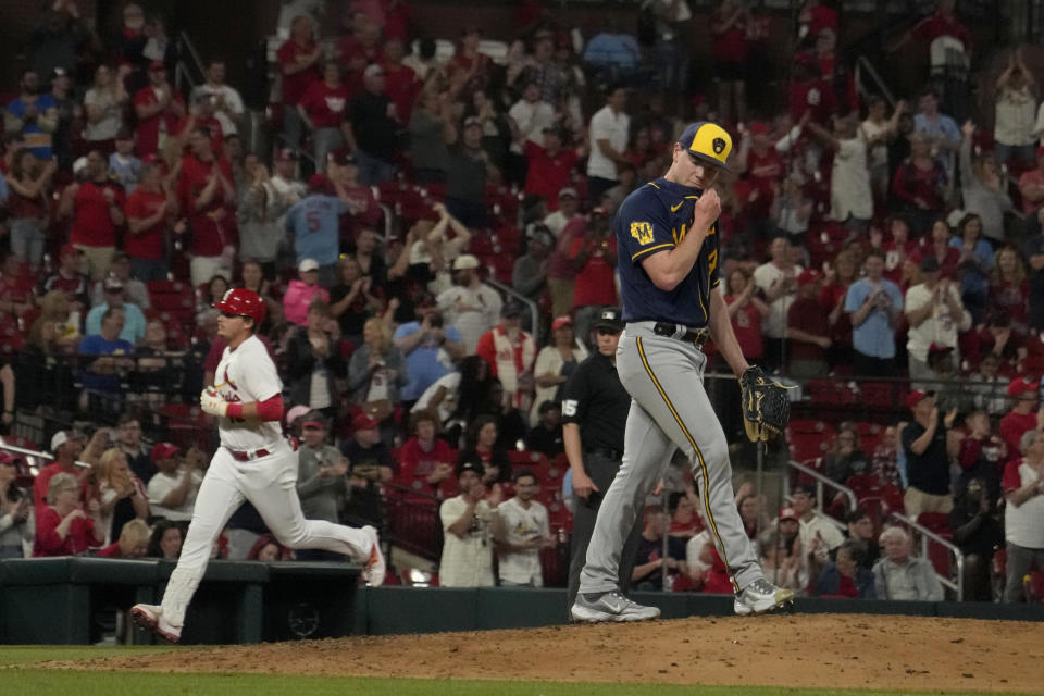 St. Louis Cardinals' Nolan Gorman, left, rounds the bases after hitting a three-run home run off Milwaukee Brewers relief pitcher Gus Varland during the eighth inning of a baseball game Monday, May 15, 2023, in St. Louis. (AP Photo/Jeff Roberson)