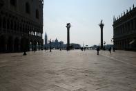 An empty St. Mark's Square is seen in Venice on the second day of an unprecedented lockdown across of all Italy imposed to slow the outbreak of coronavirus