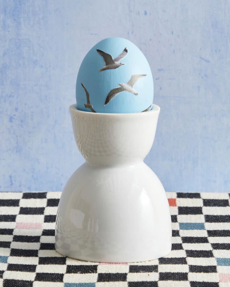 an easter egg decorated with seagulls for taylor swift's 1989 album