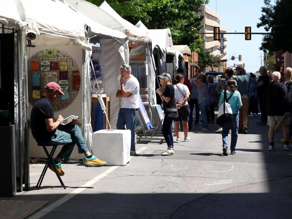 Visitors flock to downtown Fort Worth during the second day of the Main Street Arts Festival on Friday, April 21, 2023.