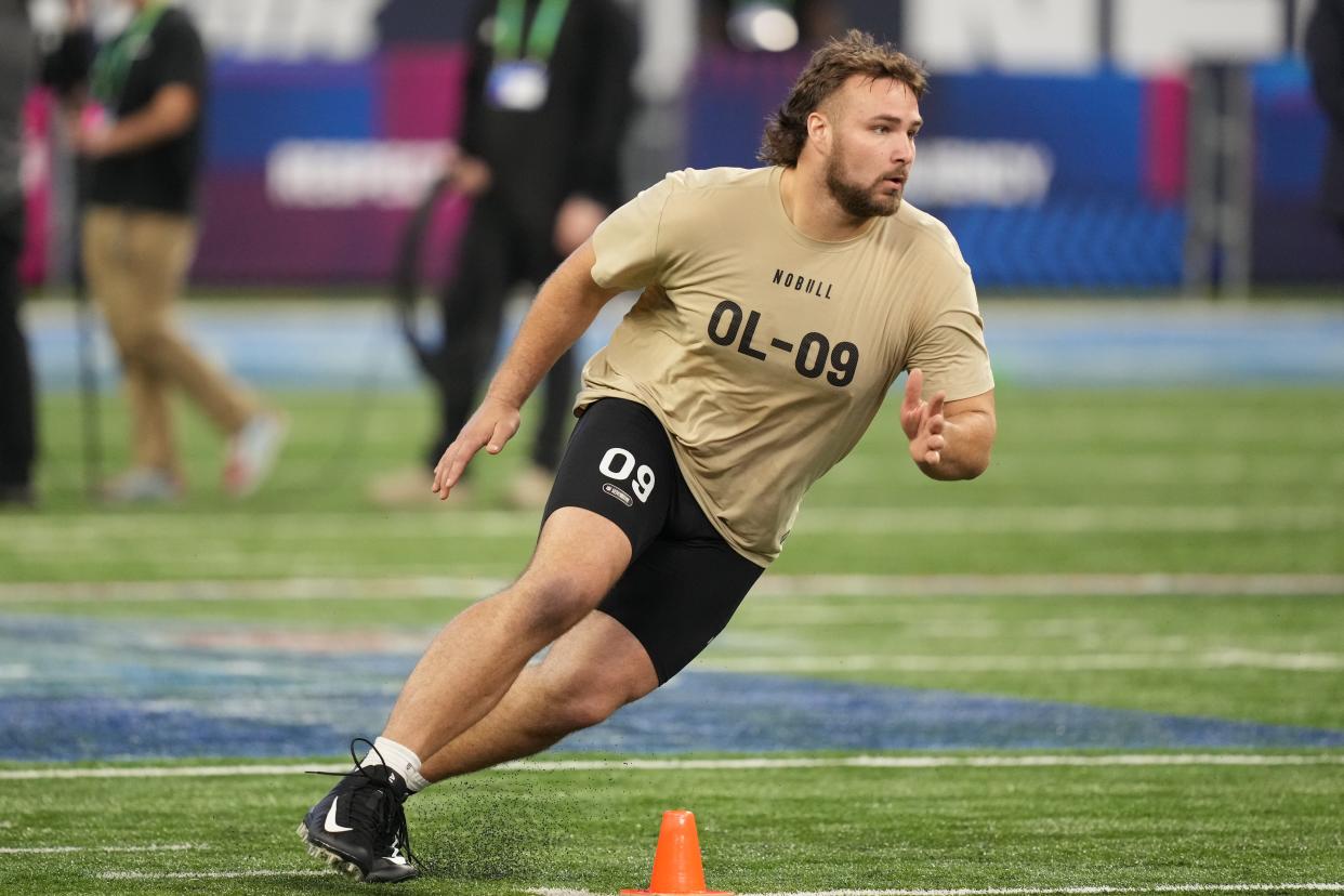 Mar 3, 2024; Indianapolis, IN, USA; Wisconsin offensive lineman Tanor Bortolini (OL09) during the 2024 NFL Combine at Lucas Oil Stadium. Mandatory Credit: Kirby Lee-USA TODAY Sports