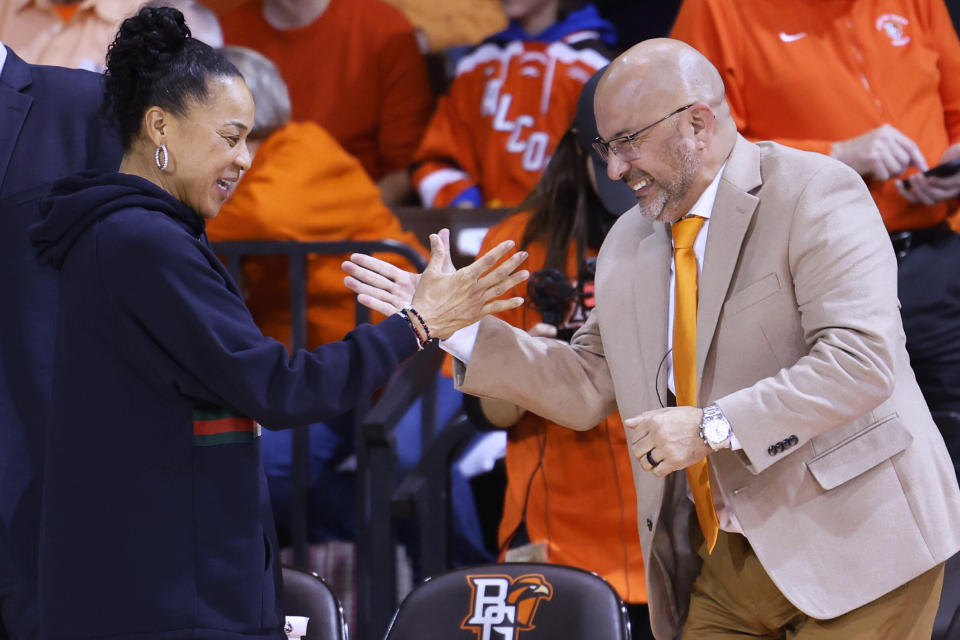 South Carolina coach Dawn Staley, left, and Bowling Green coach Fred Chmiel meet before an NCAA college basketball game in Bowling Green, Ohio, Tuesday, Dec. 19. 2023. (AP Photo/Rick Osentoski)