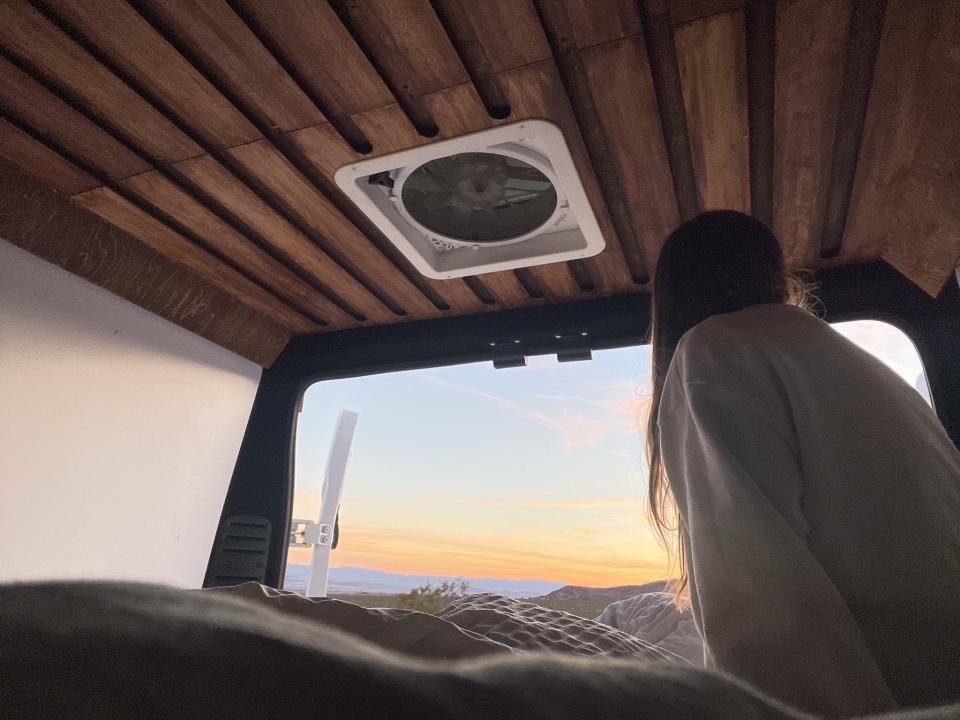 Business Insider's author watches a sunrise in Joshua Tree, California.