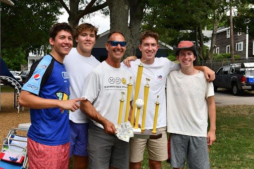 Random Smiles Project President Paul Molla (center) poses with the 2022 Tournament Champions. From Left: Gavin Moser, Evan Vassilovski, Molla, John Stafford and George Stafford.