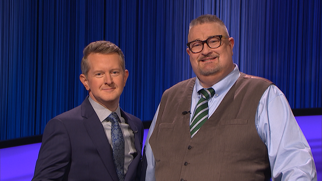 "Jeopardy" host Ken Jennings (left) is shown with Strasburg native Dan Bayer, who appeared on the television quiz show Monday.