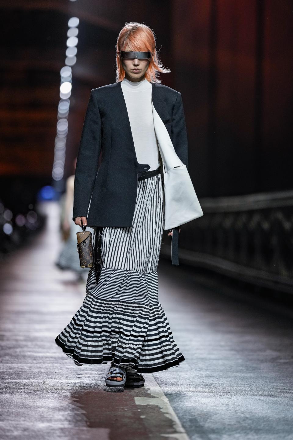 A model wears a creation for the Louis Vuitton Pre-Fall 2023 show in Seoul, South Korea, Saturday, April 29, 2023. (AP Photo/Lee Jin-man)