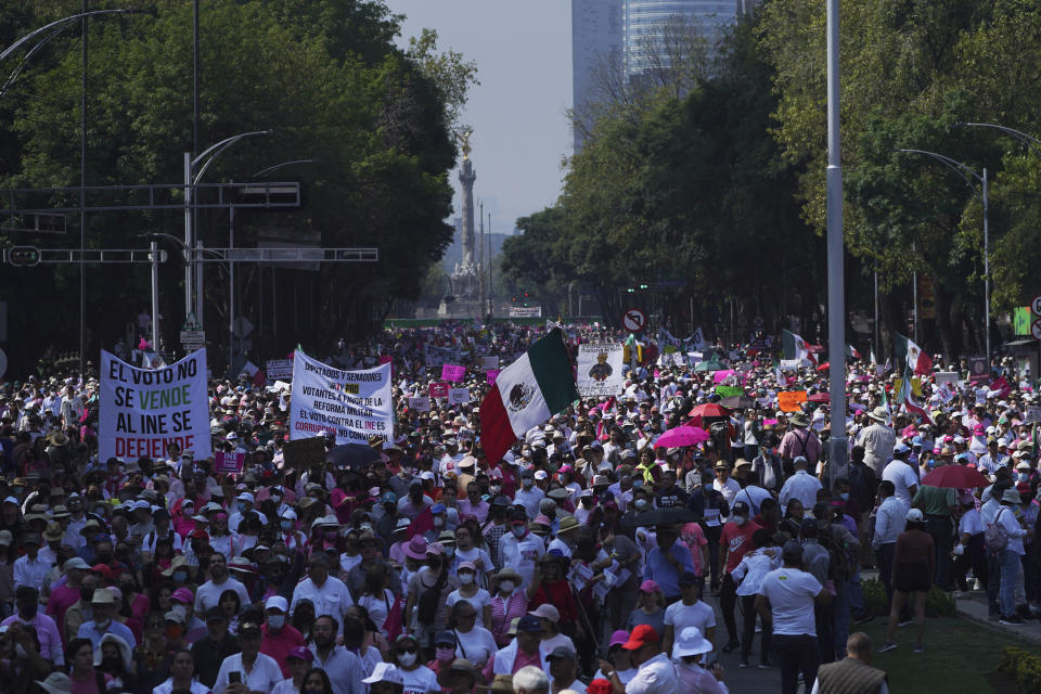 Citizen organizations march in support of Mexico's National Elections Institute as President Andrés Manuel López Obrador pushes to reform it, in Mexico City, Sunday, Nov. 13, 2022. (AP Photo/Marco Ugarte)