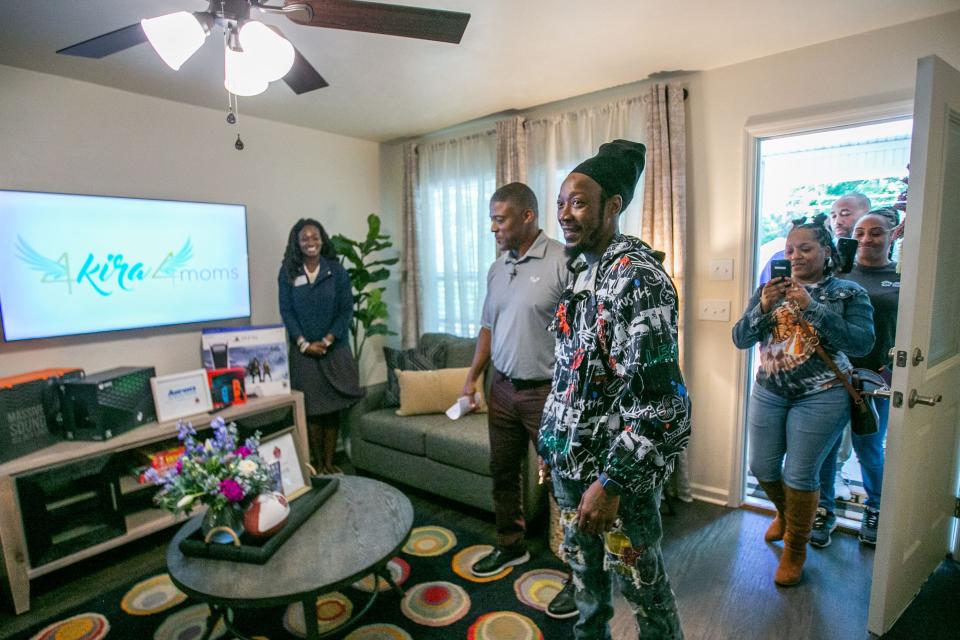Former Florida State University and NFL player Warrick Dunn shows William his new home in Tallahassee, Florida as part of Warrick Dunn Charities on Tuesday, April 18, 2023.