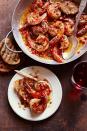 <p>Douse shrimp in Creole seasoning, garlic and seafood stock, then soak up the juices with a toasted baguette. Happy Mmmmardi Gras. </p><p>Get the <strong><a href="https://www.countryliving.com/food-drinks/recipes/a26473/garlic-clove-shrimp-recipe-ghk0315/" rel="nofollow noopener" target="_blank" data-ylk="slk:Garlic Clove Shrimp recipe;elm:context_link;itc:0;sec:content-canvas" class="link ">Garlic Clove Shrimp recipe</a> </strong>from Country Living.  </p>