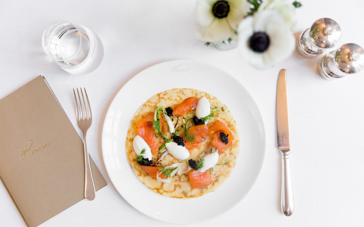 Secret Smokehouse salmon, creme fraiche, caviar, dill and spring onion pancakes at Thomas's Cafe