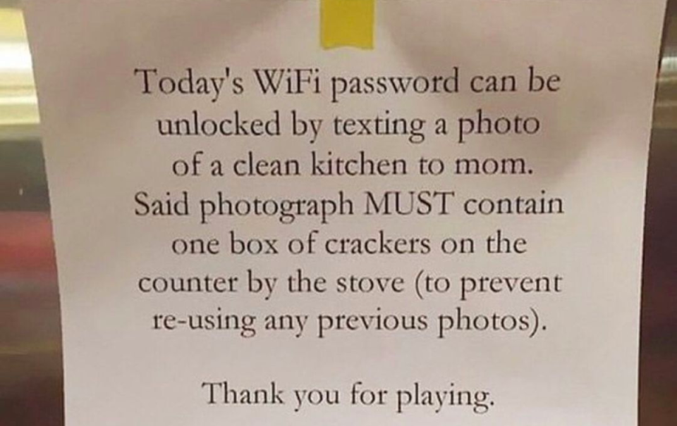 Printed out paper telling children they can get the WiFi password once they clean the kitchen.