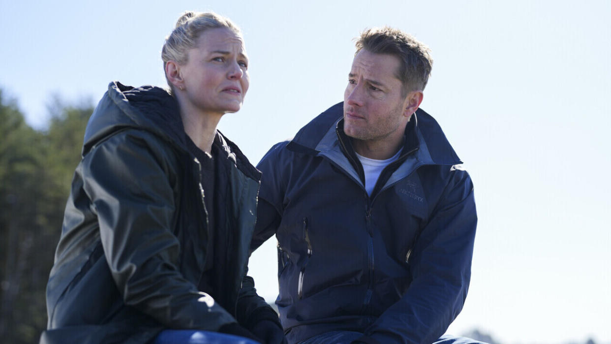  Jennifer Morrison and Justin Hartley sitting together in CBS' Tracker Season 1 finale. 