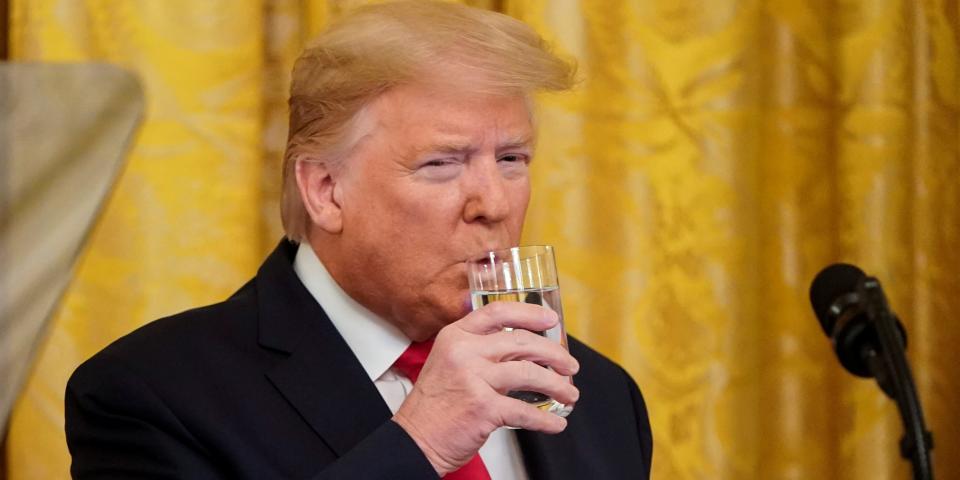 Donald Trump drinks water