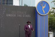 Cedric the Entertainer, host of Sunday's 73rd Primetime Emmy Awards, addresses reporters during the show's Press Preview Day, Wednesday, Sept. 14, 2021, at the Television Academy in Los Angeles. The awards show honoring excellence in American television programming will be held at the Event Deck at L.A. Live. (AP Photo/Chris Pizzello)