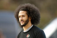 FILE - In this Nov. 16, 2019, file photo, free agent quarterback Colin Kaepernick arrives for a workout for NFL football scouts and media in Riverdale, Ga. Kaepernick is getting his first chance to work out for an NFL team since last playing in the league in 2016 when he started kneeling during the national anthem to protest police brutality and racial inequality. Two people familiar with the situation said on Wednesday, May 25, 2022, that Kaepernick will work out for the Las Vegas Raiders. (AP Photo/Todd Kirkland, File)