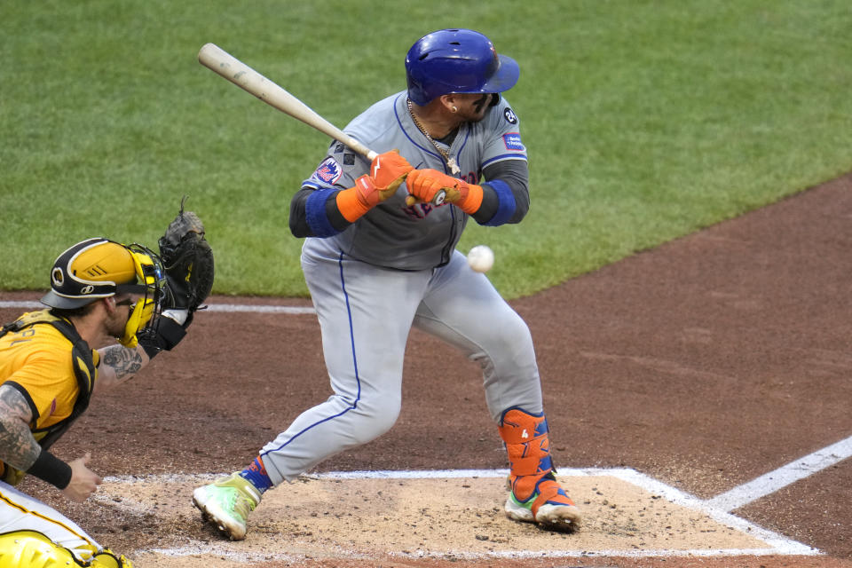 New York Mets' Francisco Alvarez, right, is hit on the elbow by a pitch from Pittsburgh Pirates starter Paul Skenes during the fourth inning of a baseball game in Pittsburgh, Friday, July 5, 2024. (AP Photo/Gene J. Puskar)