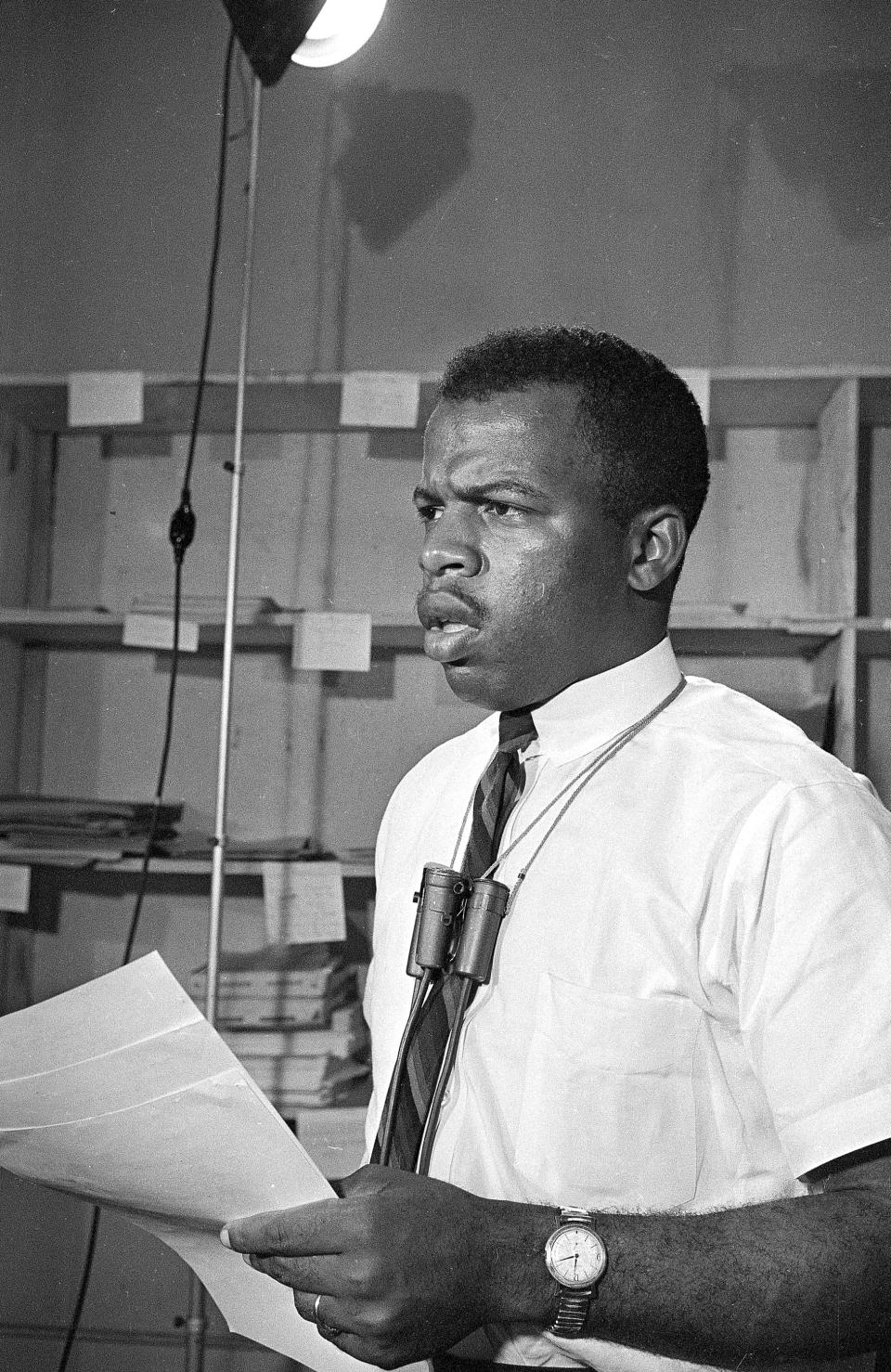 John Lewis speaks in Jackson, Miss., on June 23, 1964, urging President Johnson to protect civil rights workers and volunteers in Mississippi. Two days earlier, Michael Schwerner James Chaney and Andrew Goodman had disappeared.  Their bodies were found in August; they had been tortured and murdered.