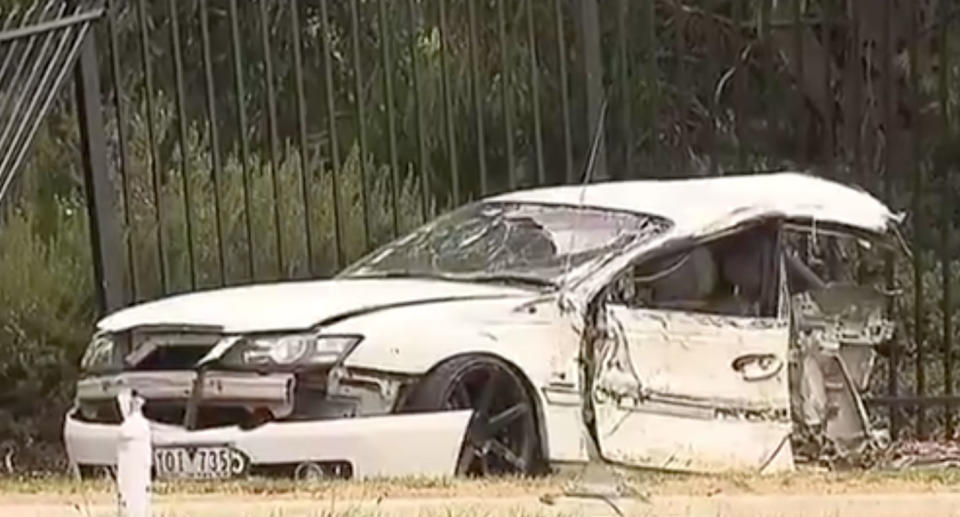 This car hit a power pole and was ripped in half. Source: 7 News