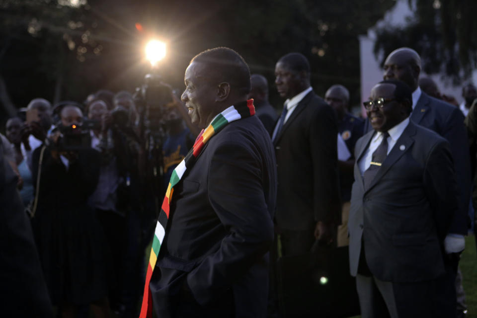 Zimbabwean President elect Emmerson Mnangagwa addresses a press conference in Harare ,Friday, Aug, 3, 2018. Zimbabwe's president says people are free to approach the courts if they have issues with the results of Monday's election, which he carried with just over 50 percent of the vote. President Emmerson Mnangagwa spoke to journalists shortly after opposition leader Nelson Chamisa called the election results manipulated and said they would be challenged in court. (AP Photo/Tsvangirayi Mukwazhi)
