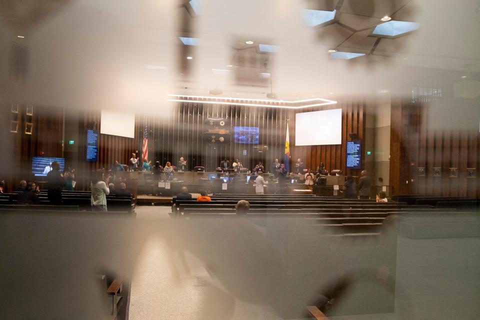 A Memphis City Council meeting can be seen through the City of Memphis seal in the meeting room door at city hall in Memphis, Tenn., on Tuesday, July 25, 2023.