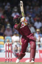 West Indies' captain Jason Holder plays a shot against England during the first One Day International cricket match at the Kensington Oval in Bridgetown, Barbados, Wednesday, Feb. 20, 2019. (AP Photo/Ricardo Mazalan)