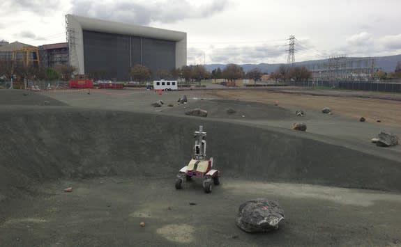 1) K10 rover near the new telerobotics control building at NASA Ames Research Center’s roverscape site.