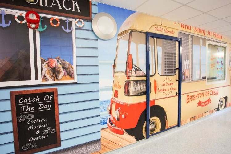 London's Royal Free Hospital has decorated its dementia wards, corridors and day rooms in a vintage seaside theme (PA)