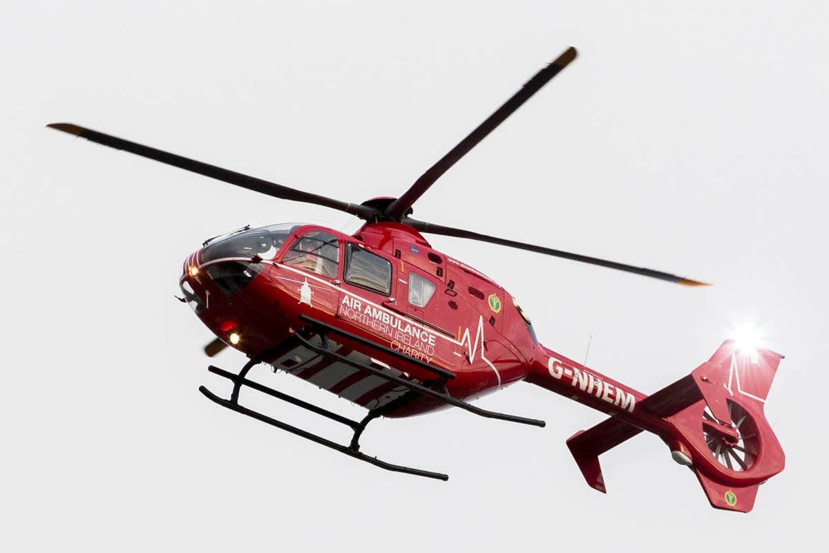 File: An air ambulance used by the Northern Ireland Helicopter Emergency Medical Service (HEMS) comes in to land on the helipad at the Royal Victoria Hospital in West Belfast (PA)