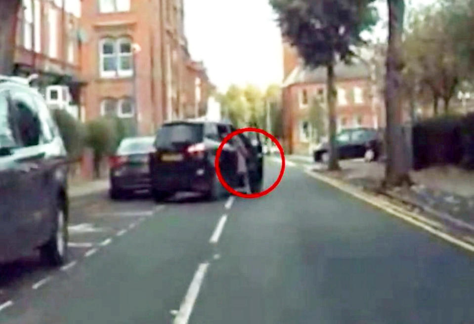 Shocking footage shows robber dragging woman along a road after stealing her car