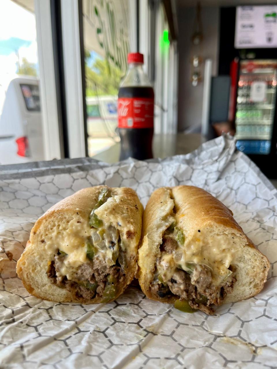 The made-fresh daily five-cheese cheese sauce makes this cheesesteak at Wally's Deli one of our favorites.