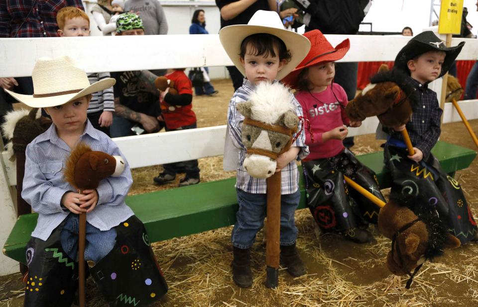 Children wait to compete in the stick horse rodeo at the 108th National Western Stock Show in Denver