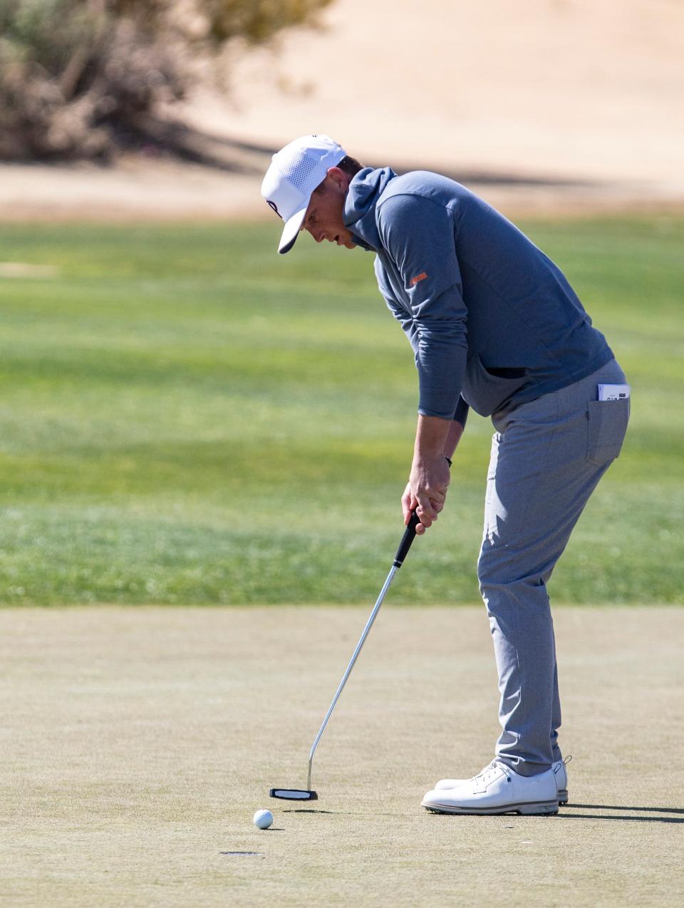 Pepperdine's William Mouw putts in on the second green during the final round of the Prestige college golf tournament on the Norman Course of PGA West in La Quinta, Calif., Wednesday, Feb. 22, 2023. 
