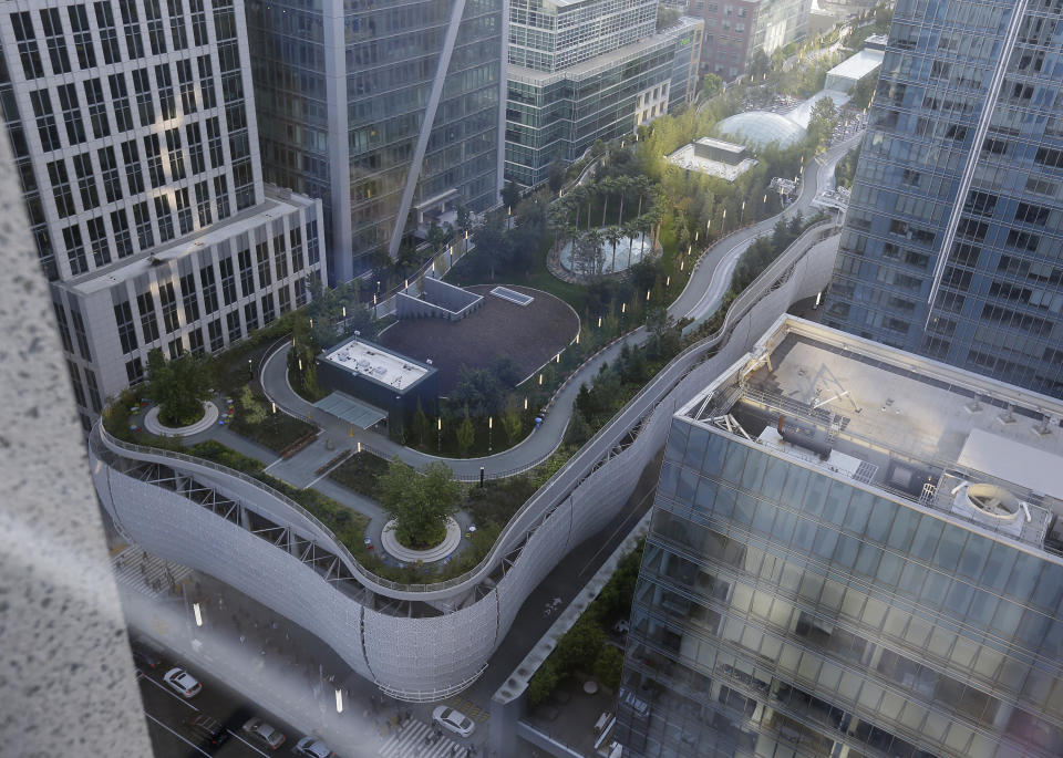 The Salesforce Transit Center complex, stretching several blocks, is seen following its closure Tuesday, Sept. 25, 2018, in San Francisco. San Francisco officials shut down the city's celebrated new $2.2 billion transit terminal Tuesday after discovering a crack in a support beam under the center's public roof garden. Coined the "Grand Central of the West," the Salesforce Transit Center opened in August near the heart of downtown after nearly a decade of construction. It was expected to accommodate 100,000 passengers each weekday, and up to 45 million people a year. (AP Photo/Eric Risberg)