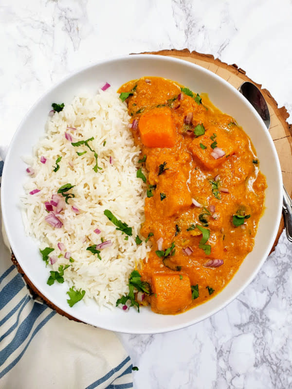 <p>Profusion Curry</p><p>This vegan and gluten-free Thai pumpkin peanut curry is a low calorie and high flavor recipe. It makes an easy weeknight dinner and lunch prep -- ready in less than 20 minutes. You may replace pumpkin with fresh or frozen sweet potatoes or even canned chickpeas. </p><p><strong>Get the Recipe: <a href="https://profusioncurry.com/thai-pumpkin-peanut-curry-recipe/" rel="nofollow noopener" target="_blank" data-ylk="slk:Thai Pumpkin Curry;elm:context_link;itc:0;sec:content-canvas" class="link rapid-noclick-resp">Thai Pumpkin Curry</a></strong></p>
